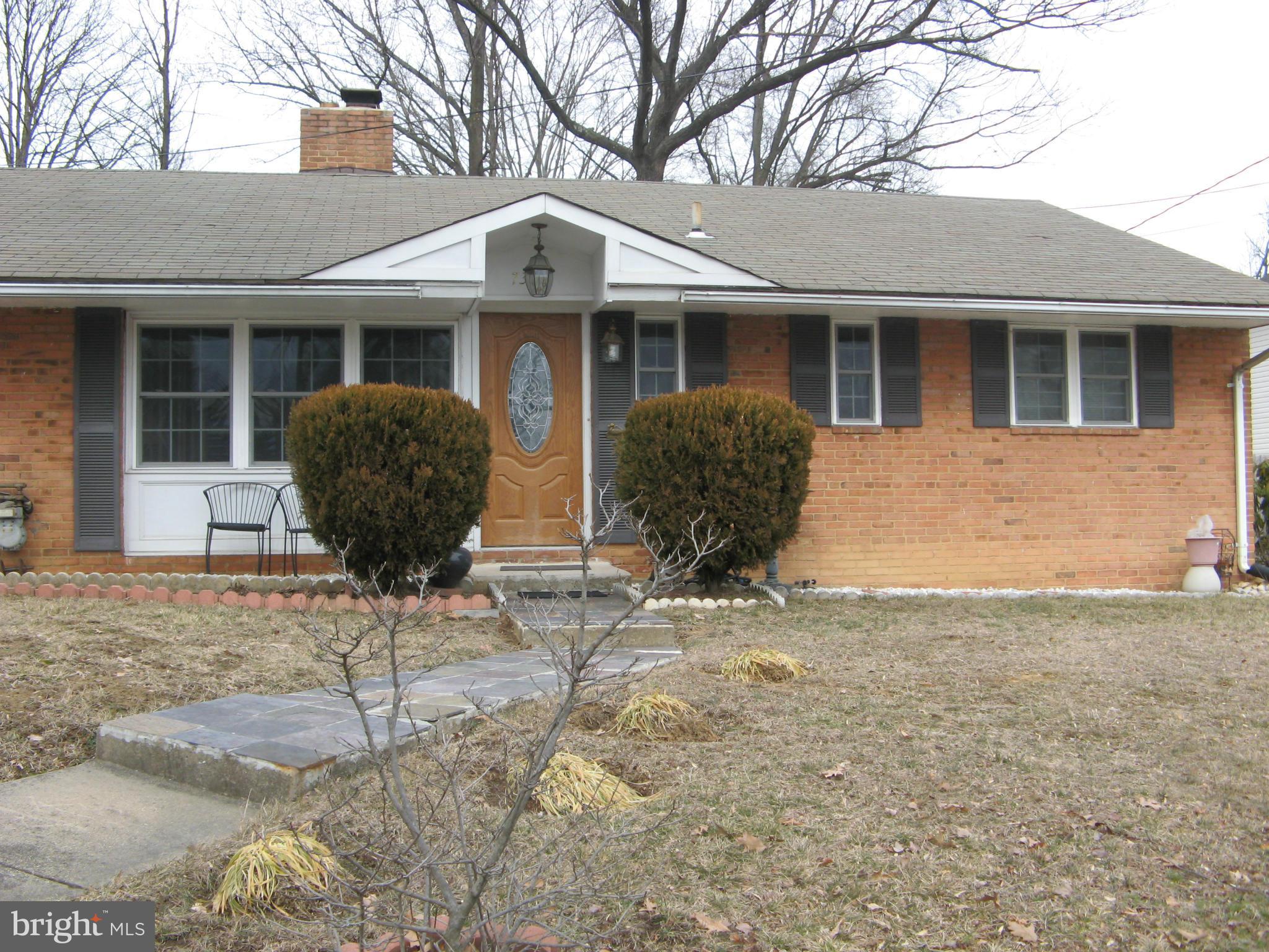 7302 Old Keene Mill Road Springfield, VA 22150 - Photo 2 of 28 a house view with a seating space