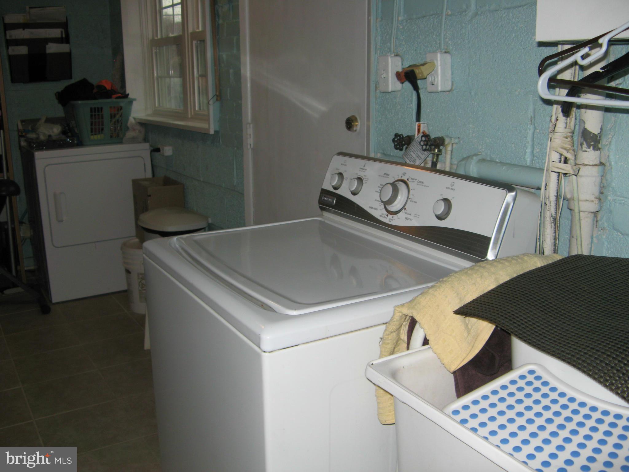 7302 Old Keene Mill Road Springfield, VA 22150 - Photo 13 of 28 a kitchen with a refrigerator and a stove top oven