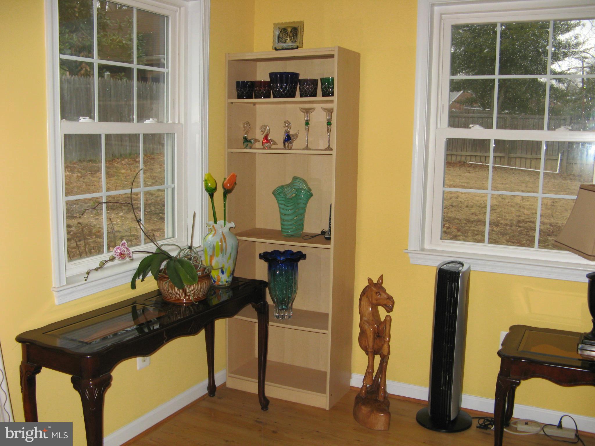 7302 Old Keene Mill Road Springfield, VA 22150 - Photo 16 of 28 a front view of a house with windows