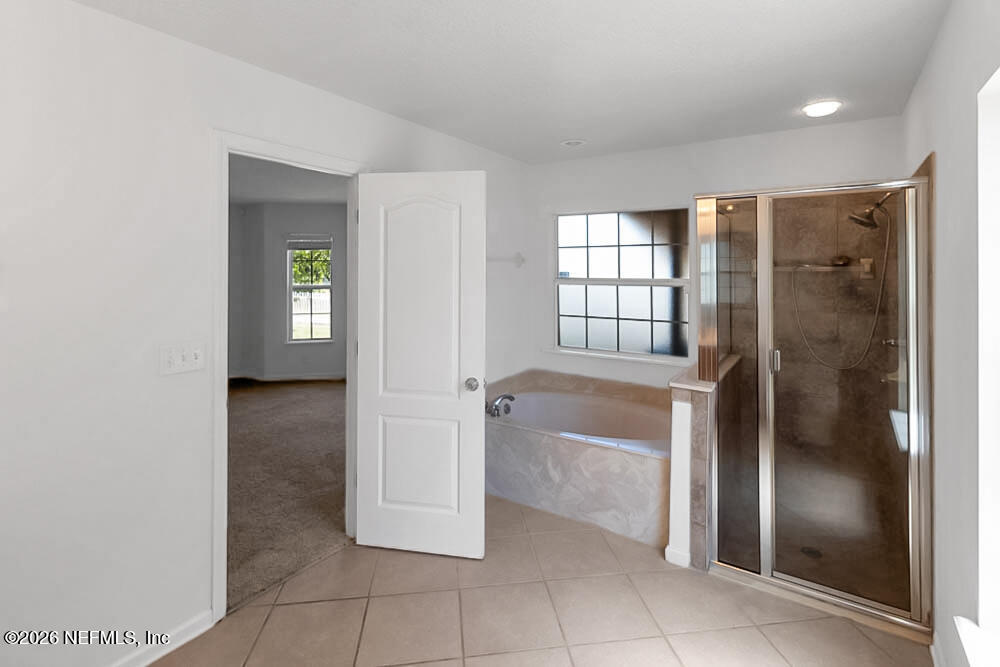 2387 Rusty Lakes Lane Jacksonville, FL 32221 - Photo 24 of 50 Primary Room Bathroom