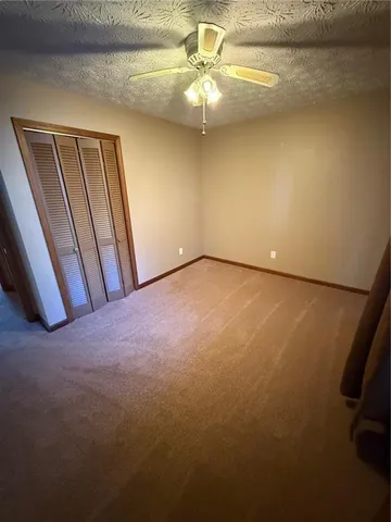 a bathroom with a sink a toilet and tub