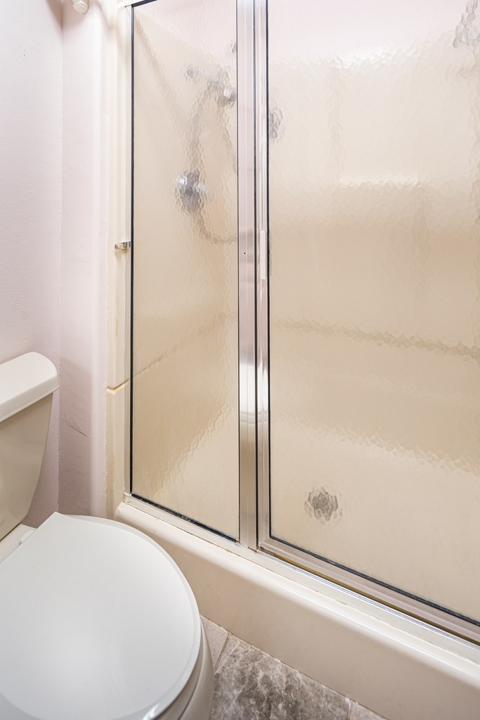 110 Sierra Road Kerrville, TX 78028 - Photo 12 of 31 a bathroom with a bathtub and a shower