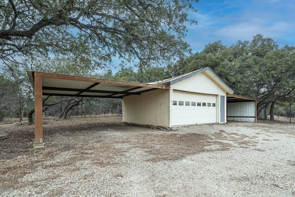110 Sierra Road Kerrville, TX 78028 - Photo 17 of 31 a view of a house with a yard