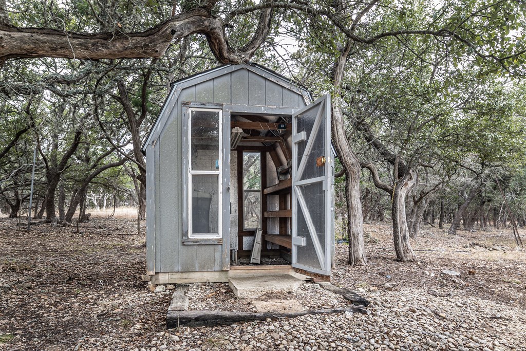110 Sierra Road Kerrville, TX 78028 - Photo 22 of 31 a front view of a house with a tree