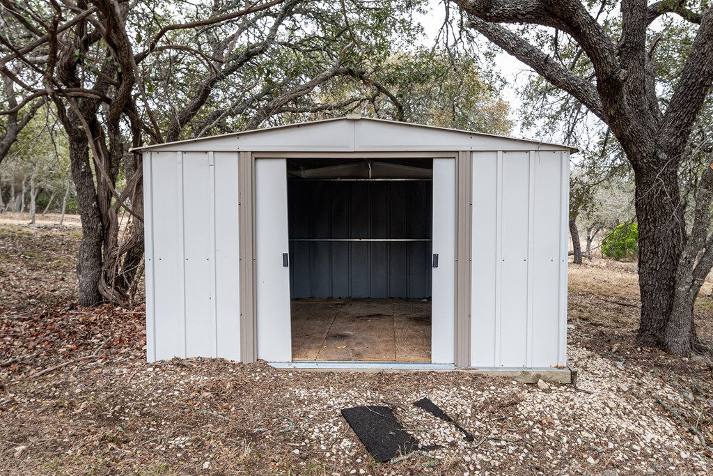 110 Sierra Road Kerrville, TX 78028 - Photo 25 of 31 a front view of a house with a yard