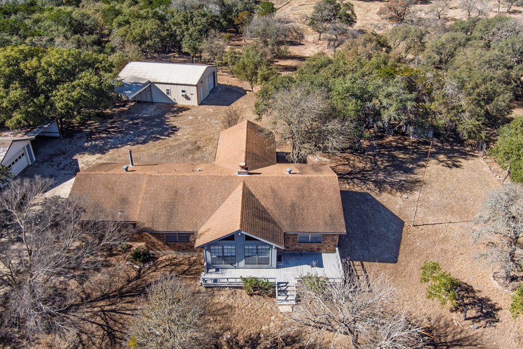 110 Sierra Road Kerrville, TX 78028 - Photo 26 of 31 an aerial view of a house with yard and trees