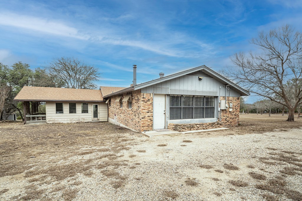 110 Sierra Road Kerrville, TX 78028 - Photo 27 of 31 a front view of a house with a yard