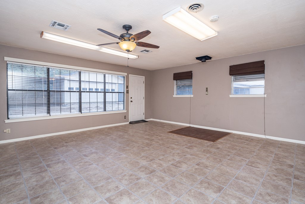 110 Sierra Road Kerrville, TX 78028 - Photo 8 of 31 a view of an empty room with a window