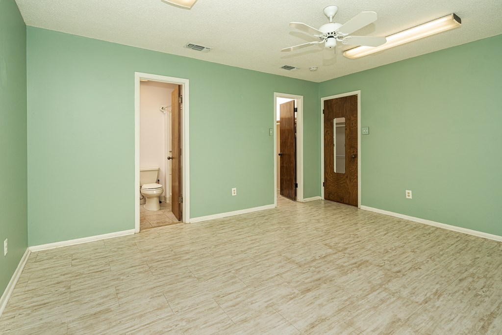 110 Sierra Road Kerrville, TX 78028 - Photo 10 of 31 an empty room with fan and entrance