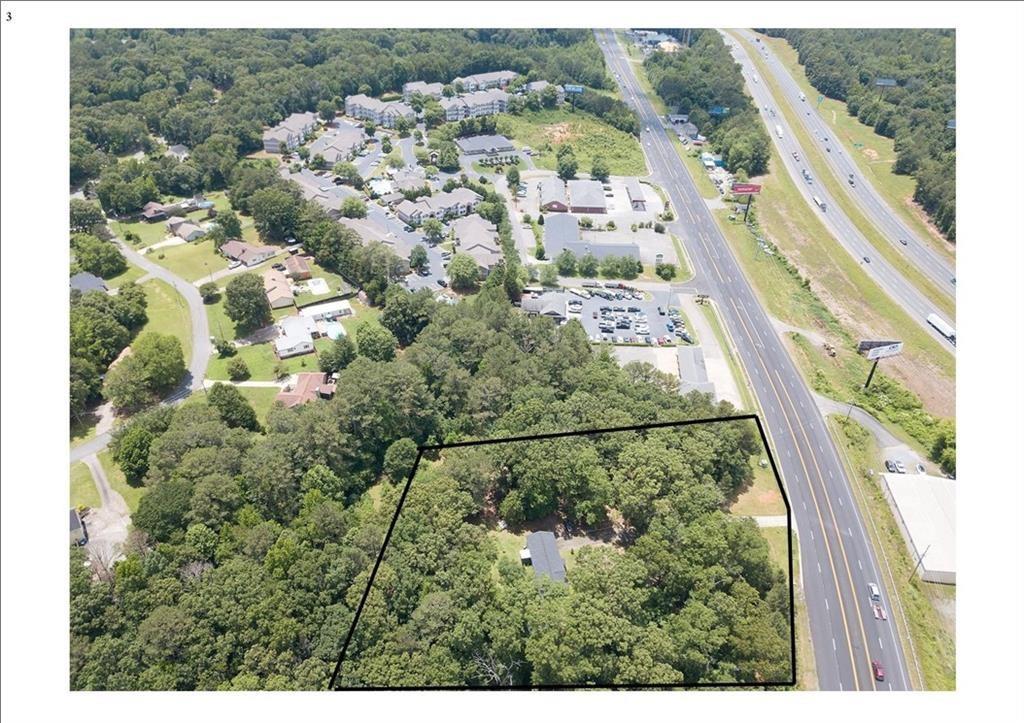 5700 Highway 20 Cartersville, GA 30121 - Photo 8 of 13 an aerial view of residential houses with outdoor space