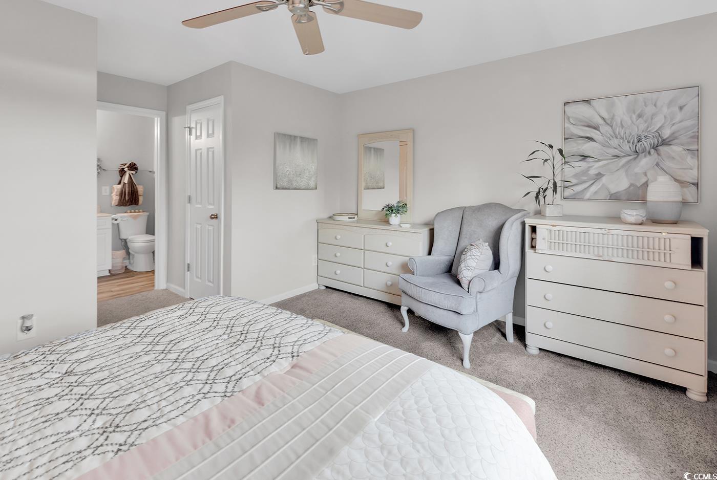 117 Butkus Drive, Unit 2 Myrtle Beach, SC 29588 - Photo 19 of 39 Bedroom with light colored carpet and a ceiling fan