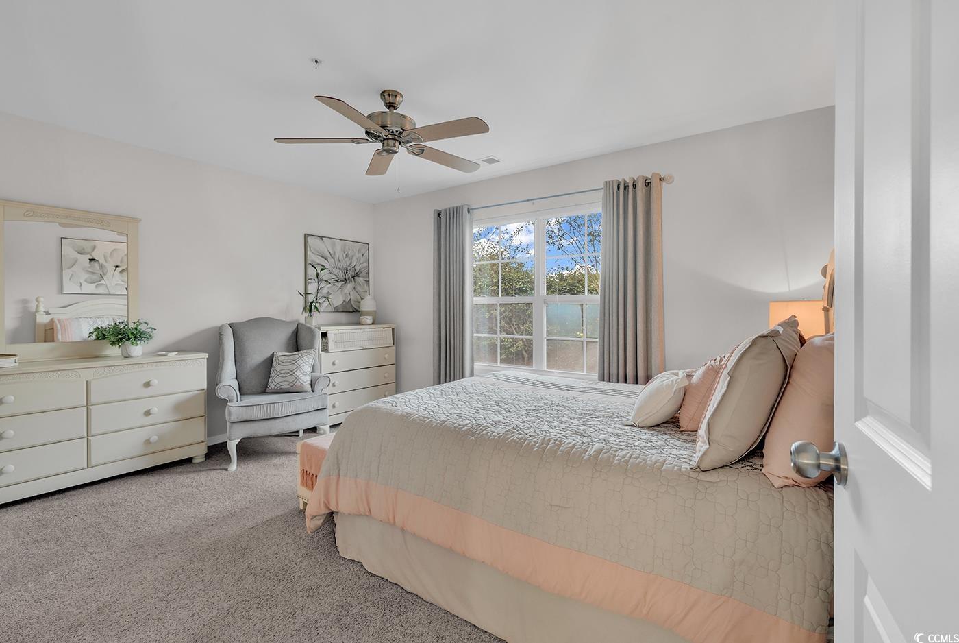 117 Butkus Drive, Unit 2 Myrtle Beach, SC 29588 - Photo 20 of 39 Bedroom featuring carpet floors and a ceiling fan