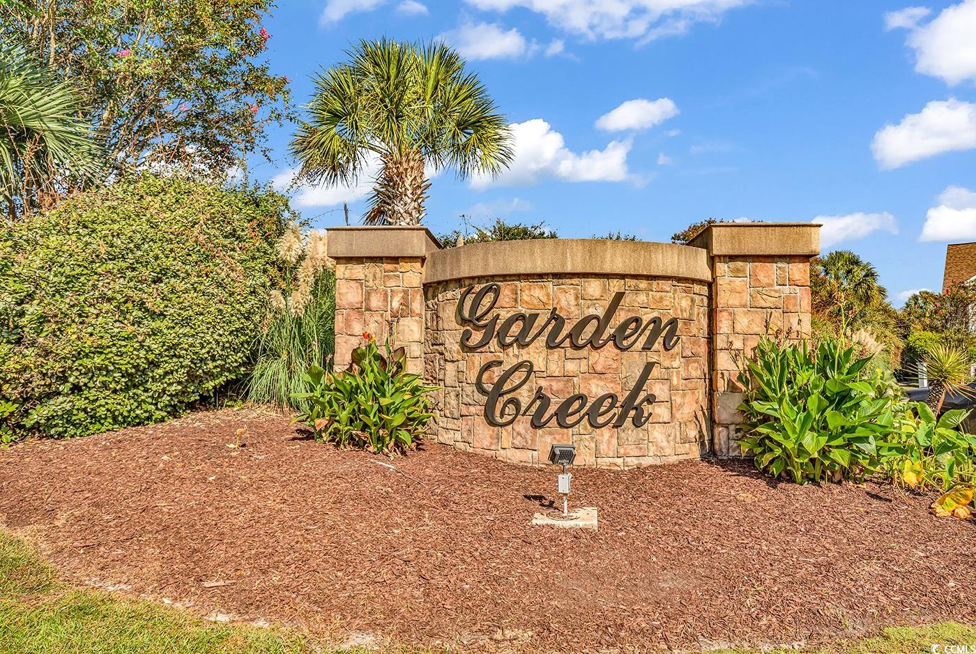 117 Butkus Drive, Unit 2 Myrtle Beach, SC 29588 - Photo 34 of 39 View of community / neighborhood sign