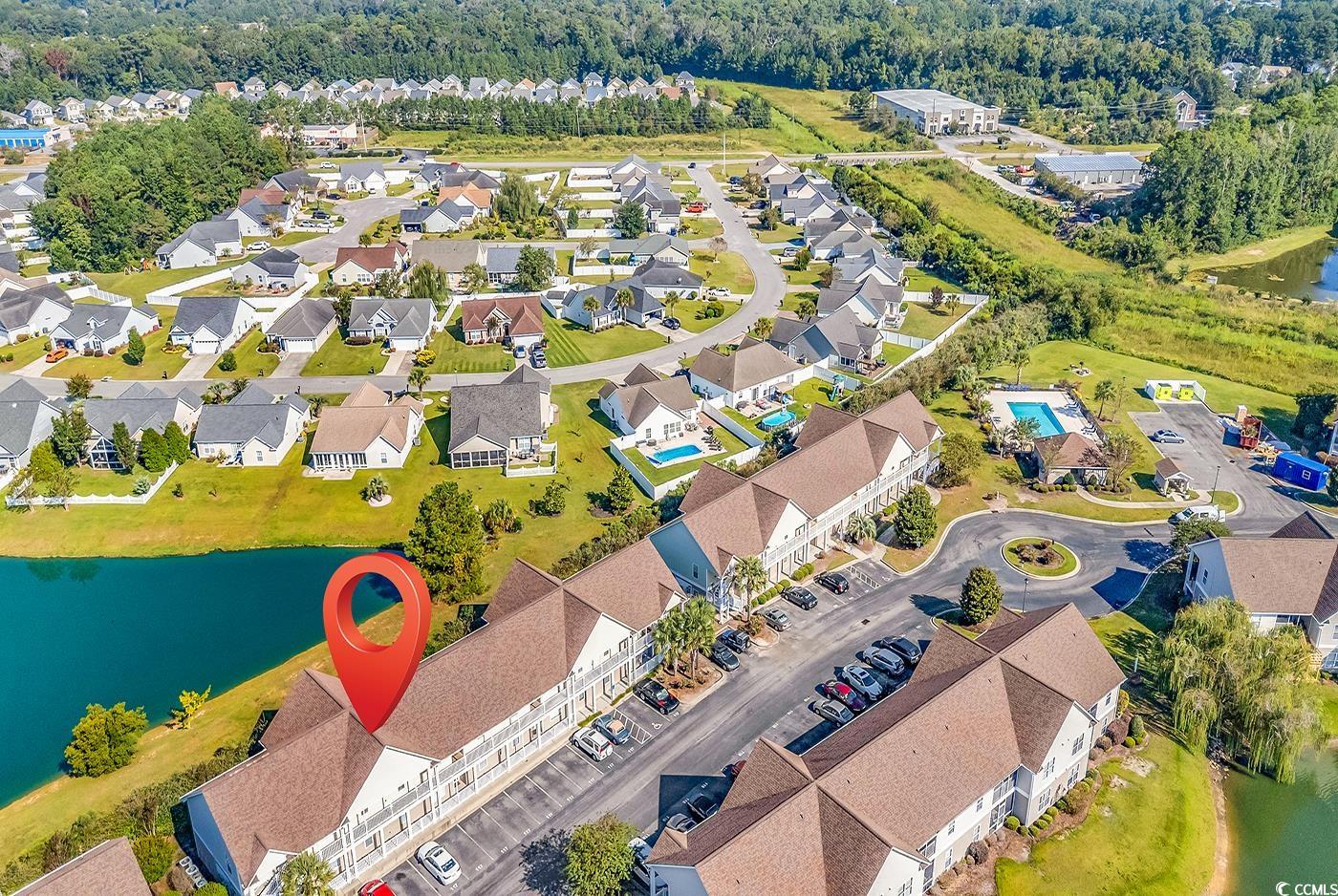 117 Butkus Drive, Unit 2 Myrtle Beach, SC 29588 - Photo 37 of 39 Aerial view of residential area with a large body of water