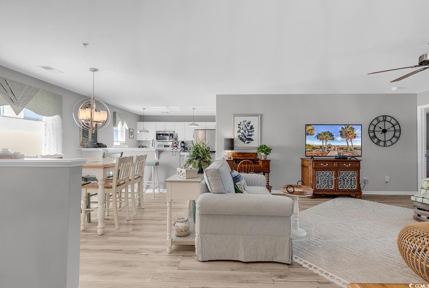 117 Butkus Drive, Unit 2 Myrtle Beach, SC 29588 - Photo 8 of 39 Living room featuring light wood-style flooring and ceiling fan
