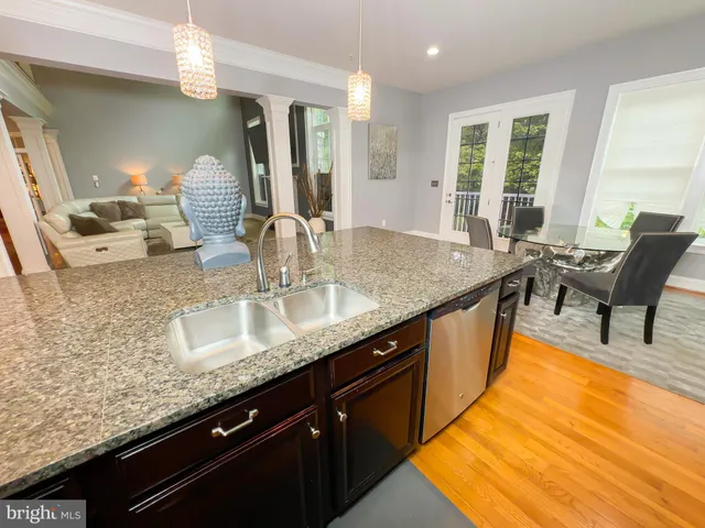 a living room with fireplace furniture and a flat screen tv