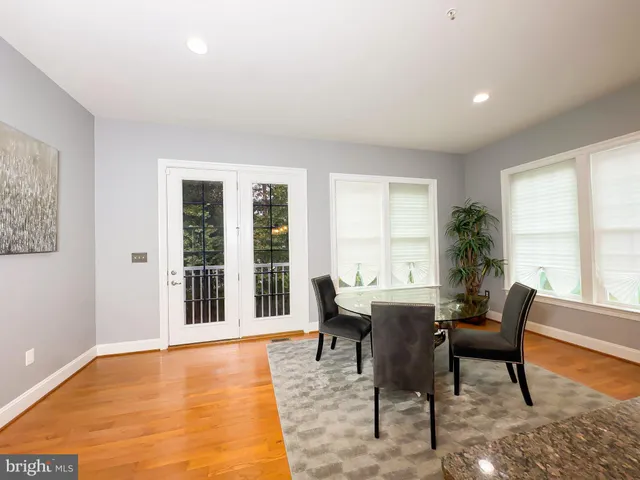 a view of an entryway with a hardwood
