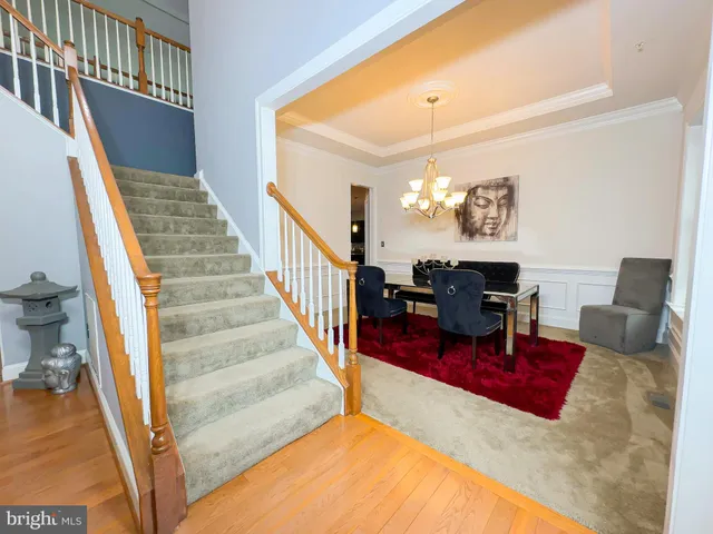 a view of livingroom with furniture and workspace