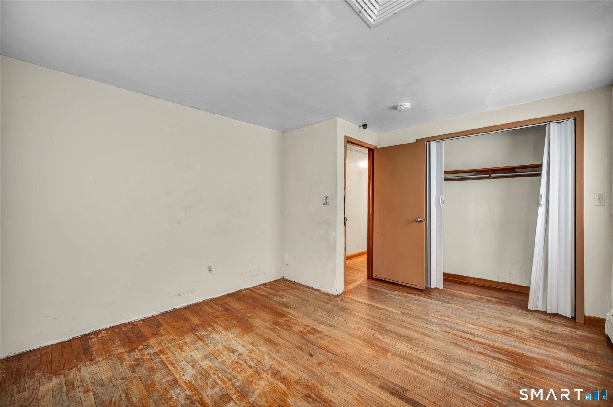 740 Rainbow Road Windsor, CT 06095 - Photo 24 of 40 a view of empty room with wooden floor