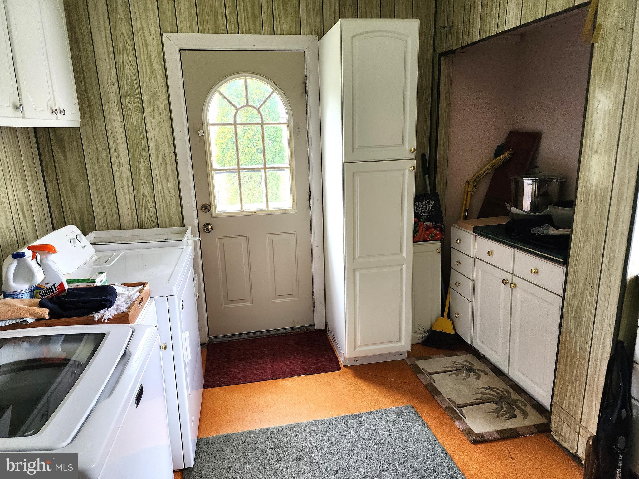 2613 Caranel Road Broomall, PA 19008 - Photo 13 of 49 a kitchen with a sink a refrigerator and cabinets