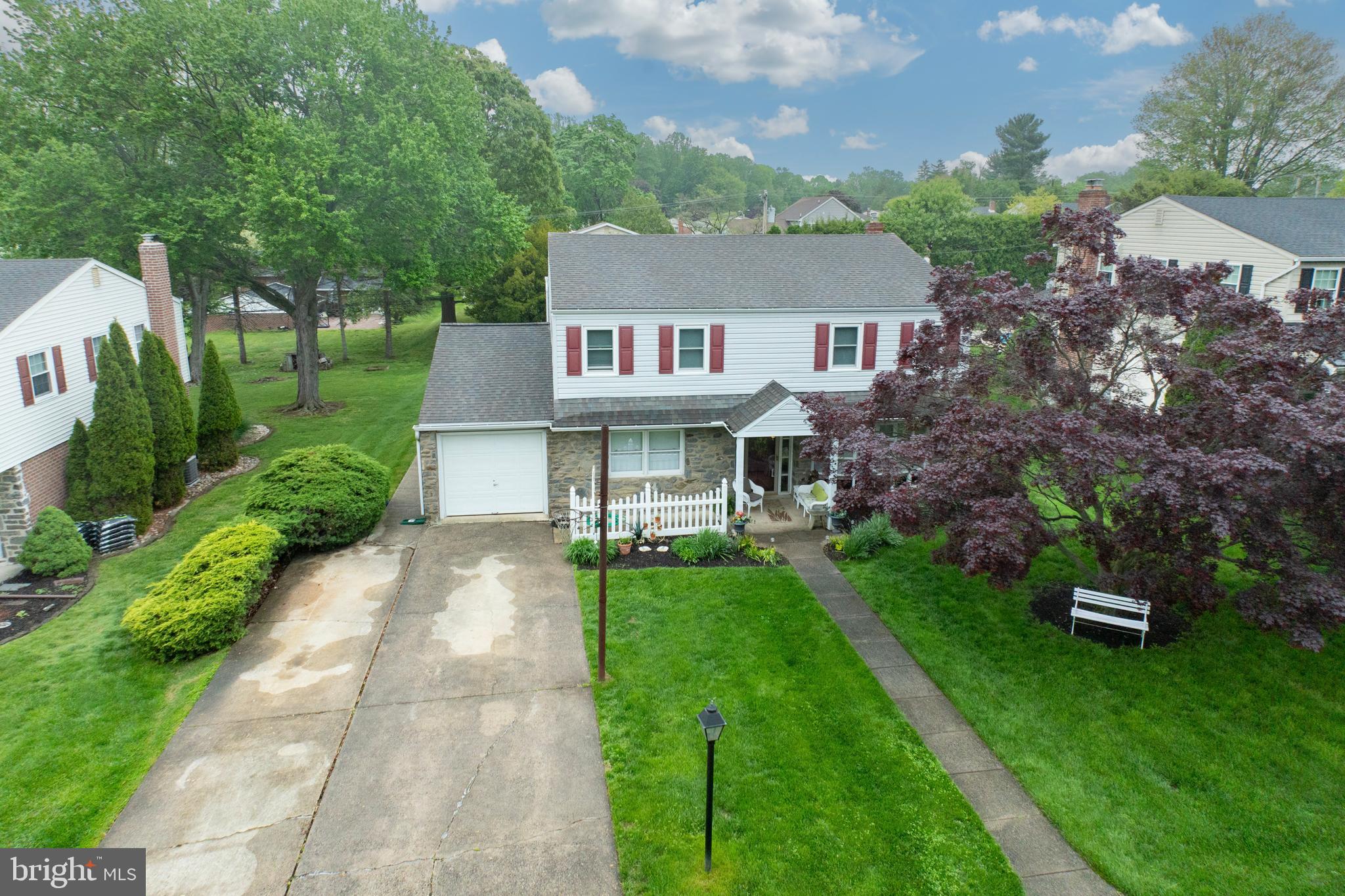 2613 Caranel Road Broomall, PA 19008 - Photo 34 of 49 a front view of a house with a garden
