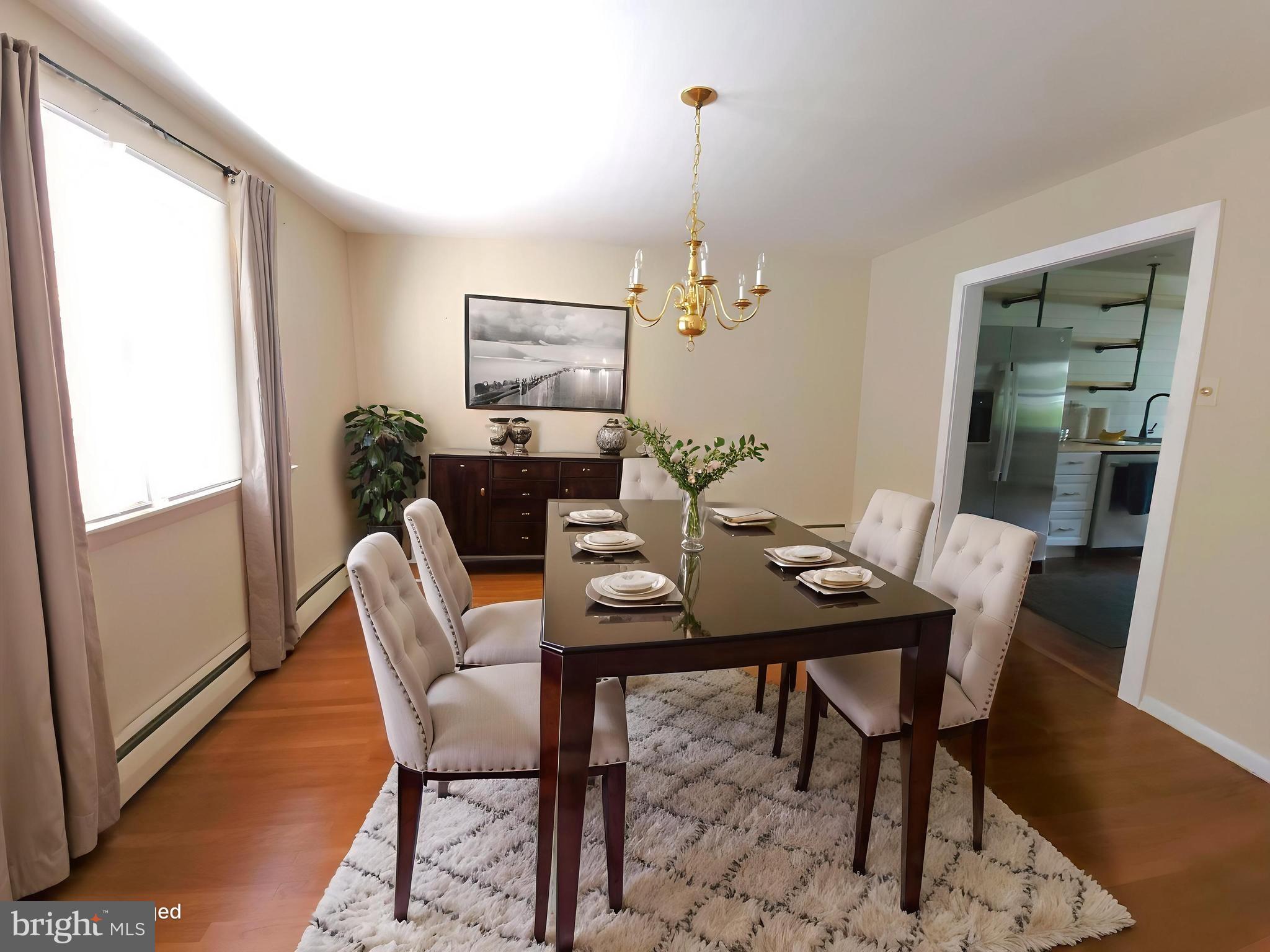 2613 Caranel Road Broomall, PA 19008 - Photo 6 of 49 a view of a dining room with furniture window and wooden floor