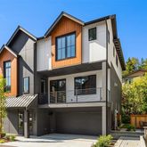 a front view of a house with parking