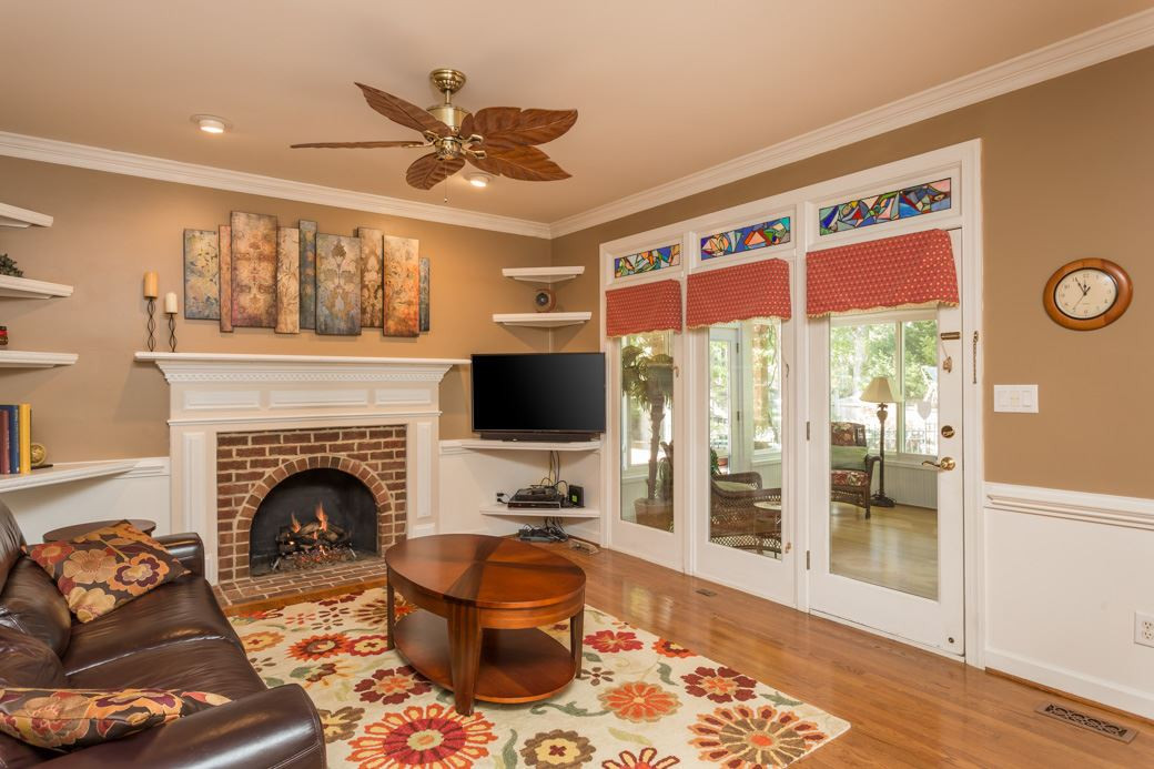 5215 Coffee Tree Drive Raleigh, NC 27613 - Photo 11 of 25 Gorgeous chair railings run around the family room and dining room. Family Room