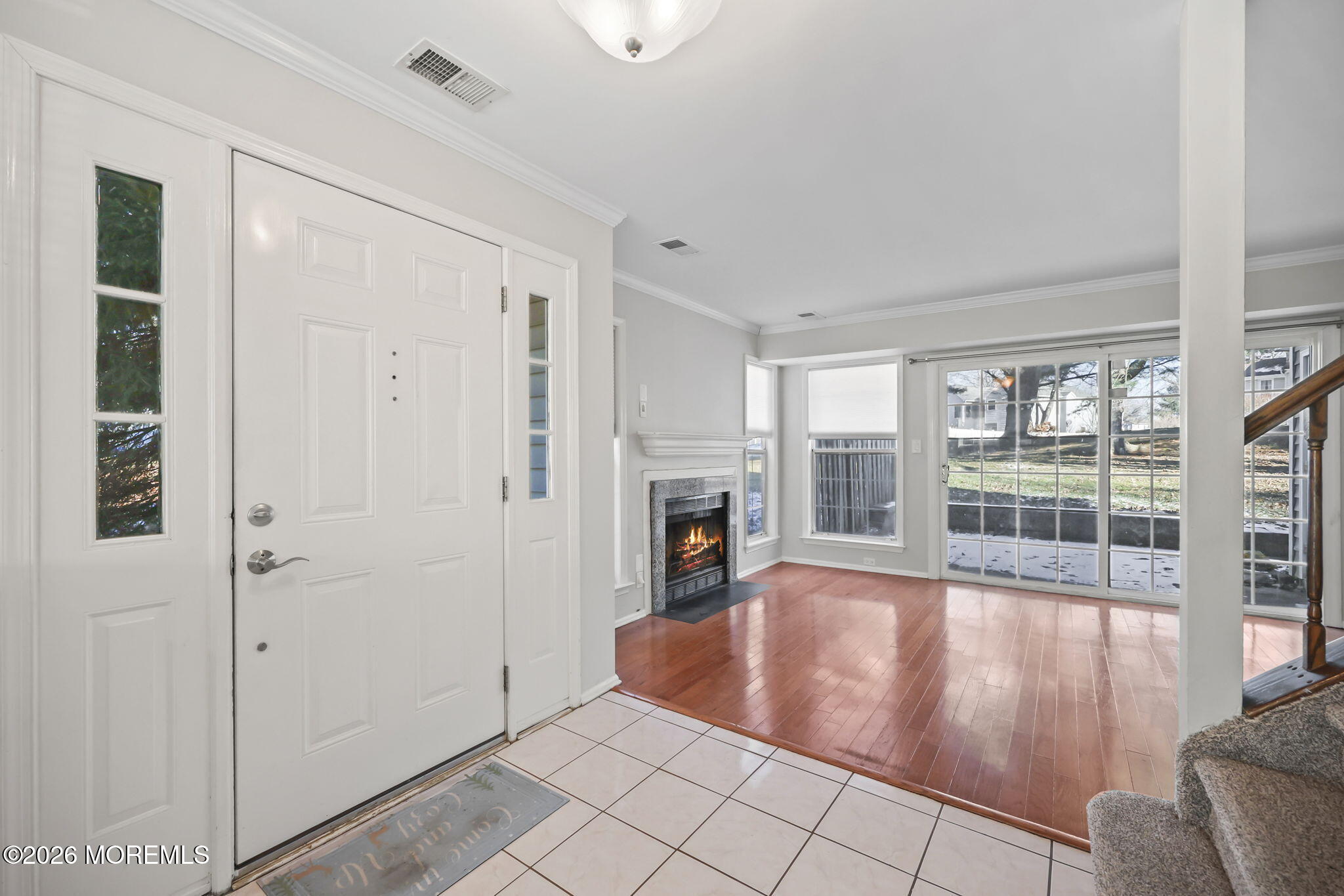 12 Duncan Way Freehold, NJ 07728 - Photo 11 of 30 a view of livingroom with furniture large window and hardwood floor