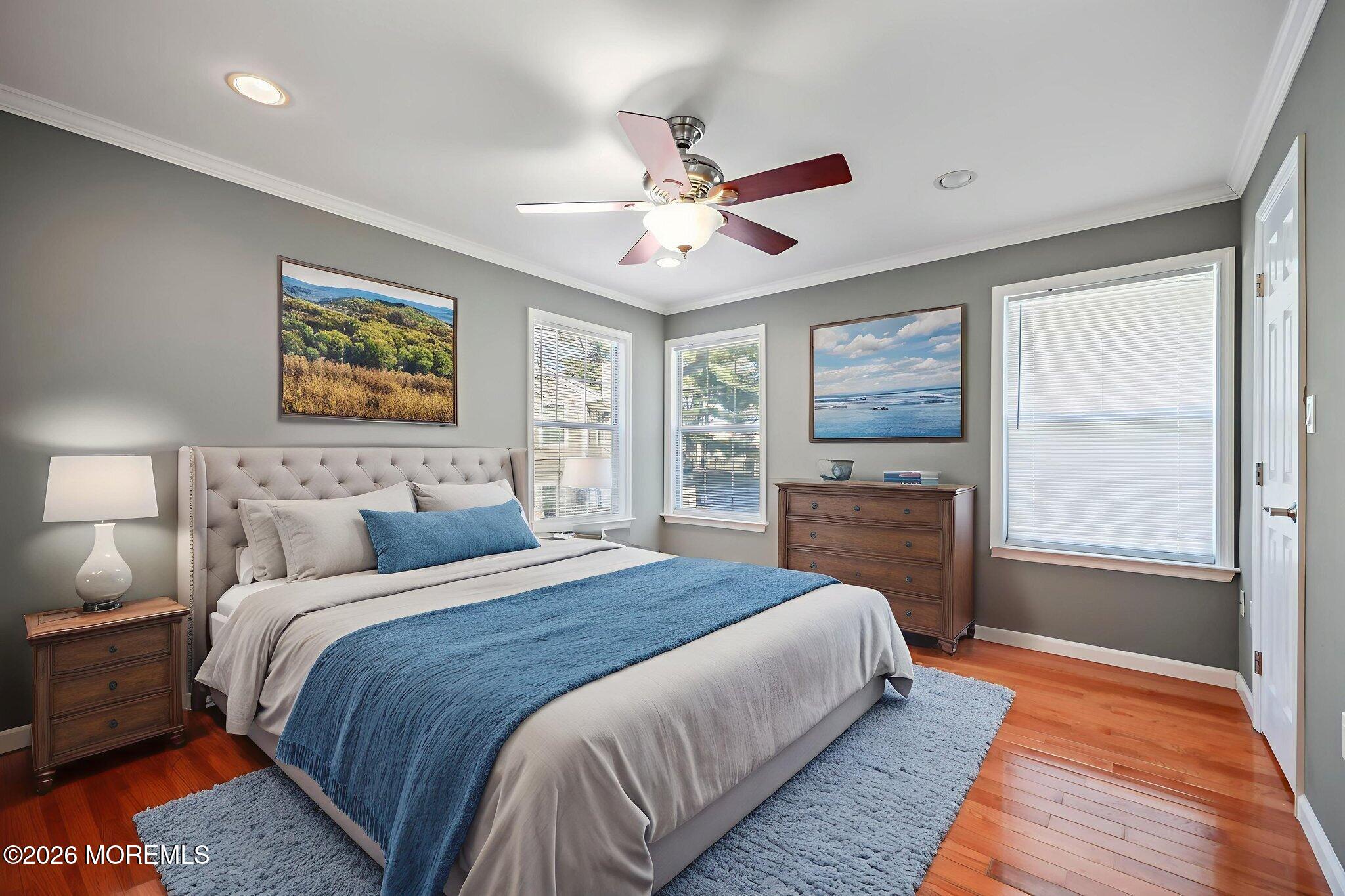 12 Duncan Way Freehold, NJ 07728 - Photo 17 of 30 a spacious bedroom with a large bed and a window