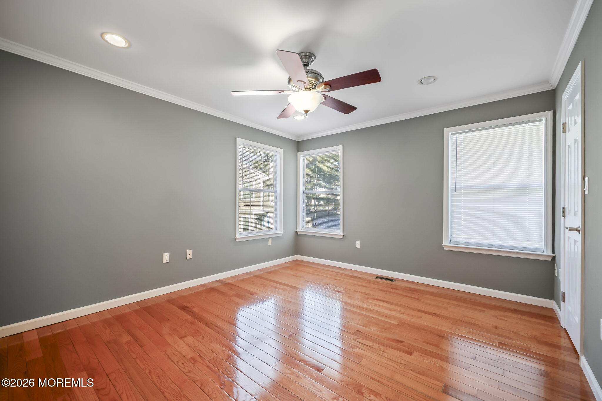 12 Duncan Way Freehold, NJ 07728 - Photo 18 of 30 wooden floor in an empty room with a window
