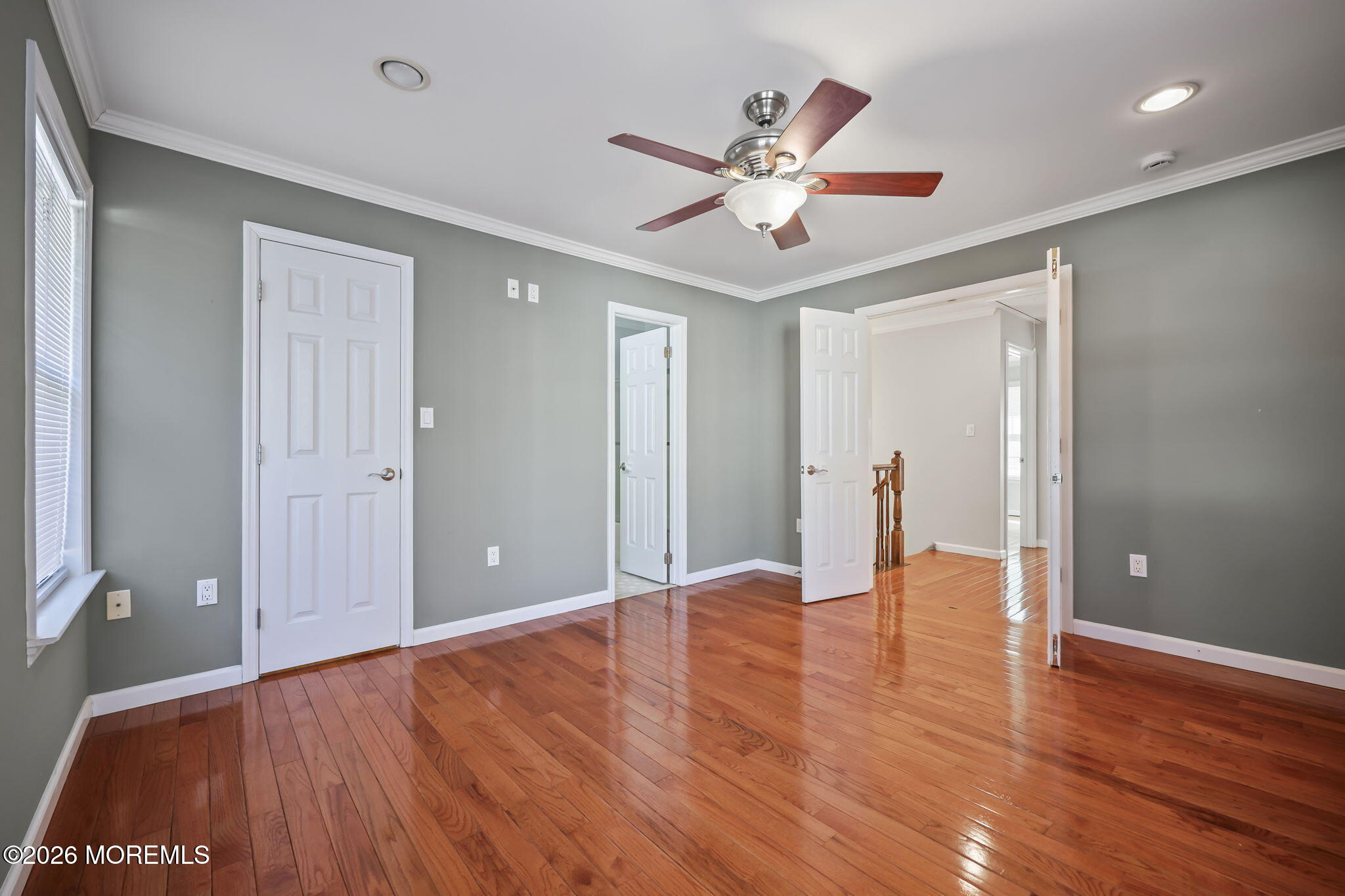 12 Duncan Way Freehold, NJ 07728 - Photo 19 of 30 a view of an empty room and wooden floor