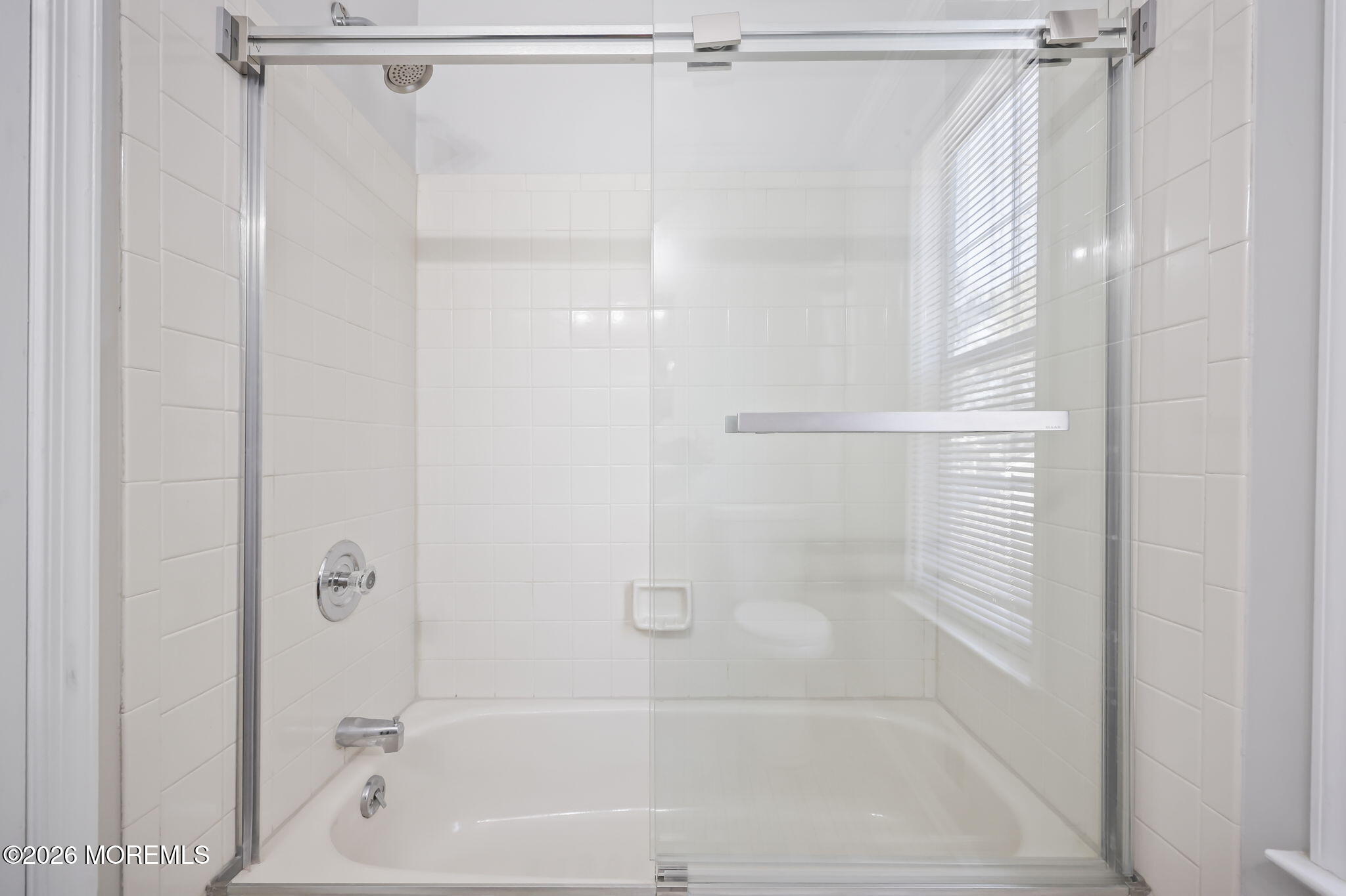12 Duncan Way Freehold, NJ 07728 - Photo 26 of 30 a bathroom with a glass shower door