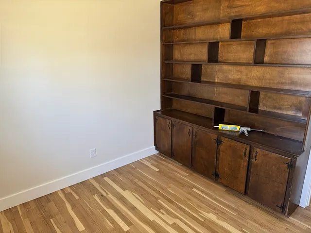 a view of a room with racks on the wall