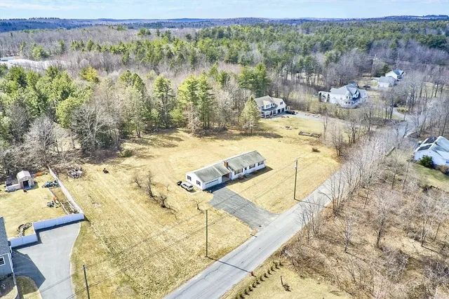 a view of a swimming pool with a lake view