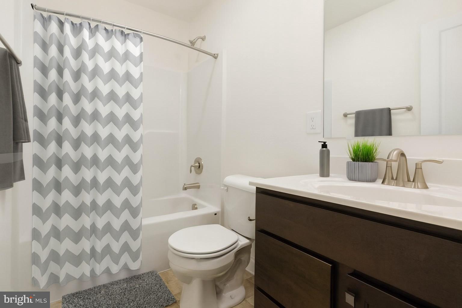 168 Ledger Drive, Unit 74 Hanover, PA 17331 - Photo 18 of 28 a bathroom with a sink toilet and shower