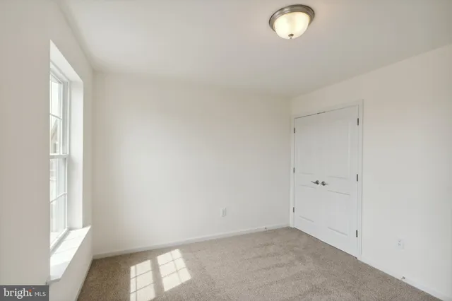 a view of empty room with window