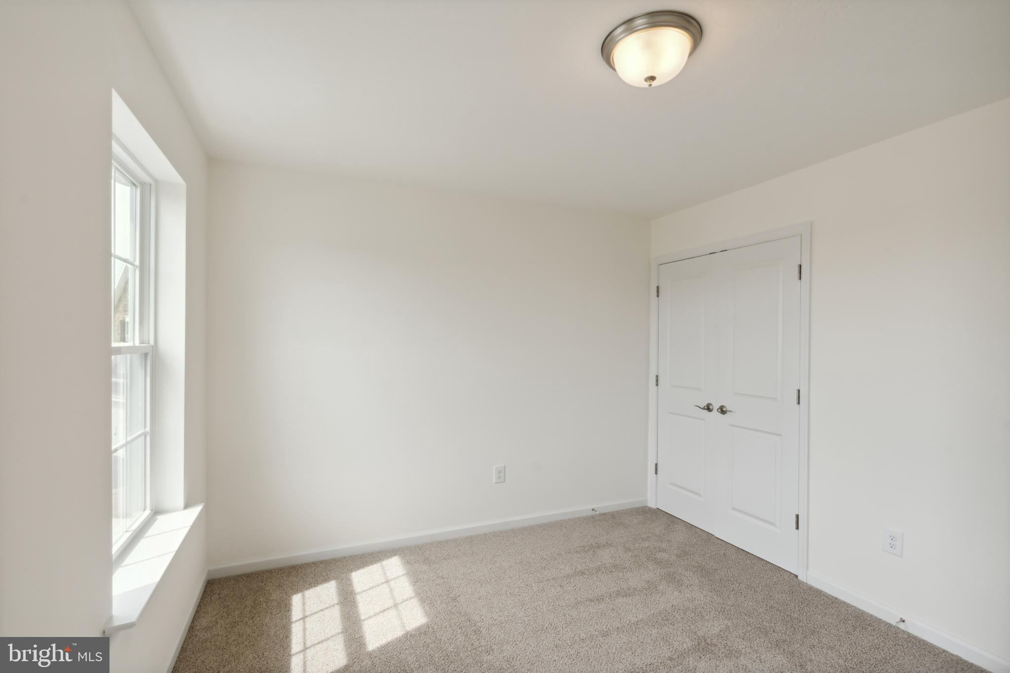 168 Ledger Drive, Unit 74 Hanover, PA 17331 - Photo 22 of 28 a view of empty room with window