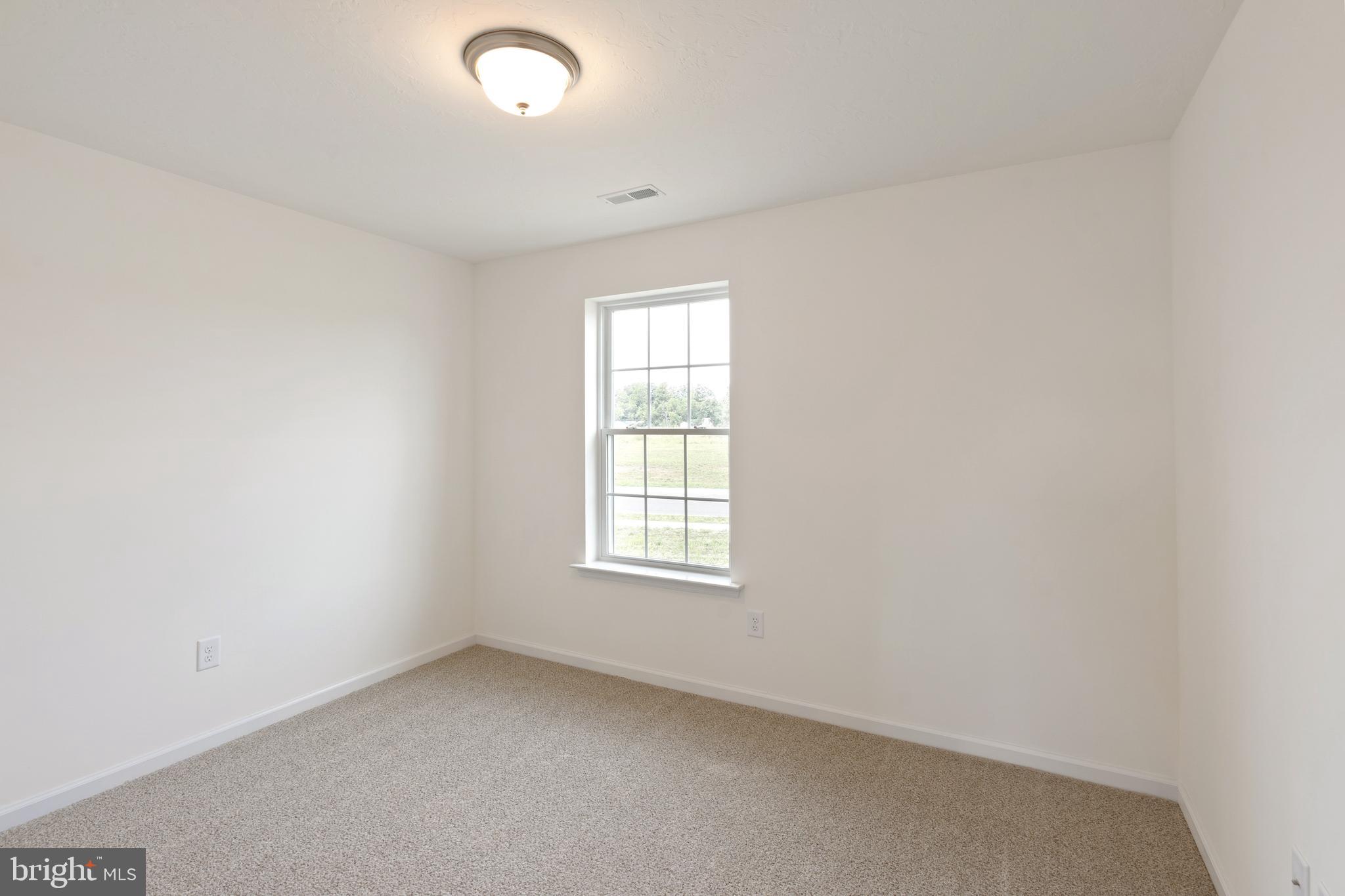 168 Ledger Drive, Unit 74 Hanover, PA 17331 - Photo 24 of 28 an empty room with a window