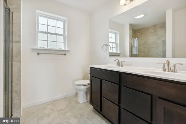 a bathroom with a sink and a toilet