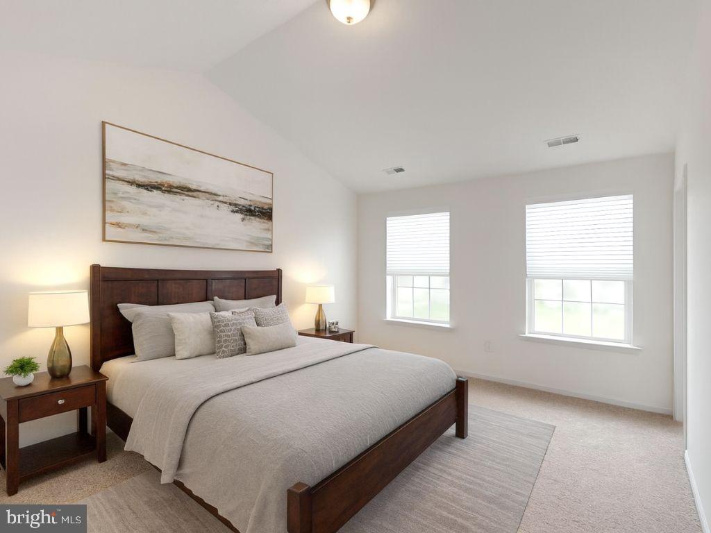 168 Ledger Drive, Unit 74 Hanover, PA 17331 - Photo 7 of 28 a bedroom with a bed and a window