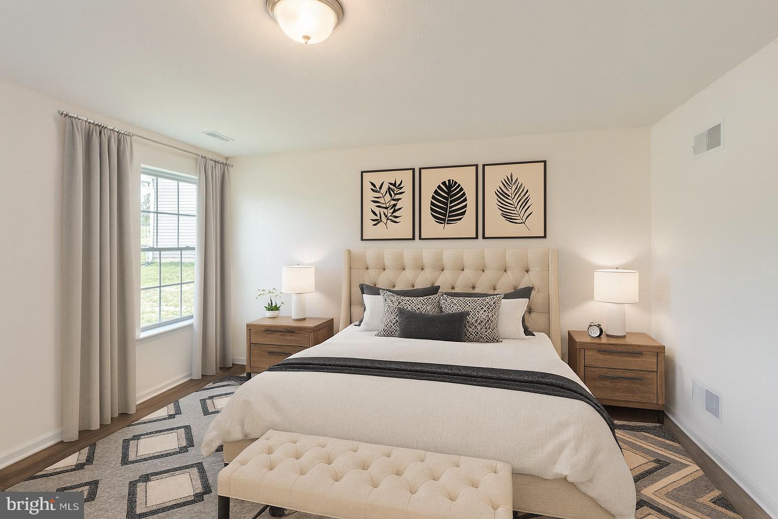 168 Ledger Drive, Unit 74 Hanover, PA 17331 - Photo 10 of 28 a bedroom with a bed and a table