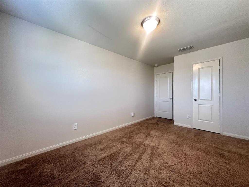 14310 Wrangler Way Dallas, TX 75253 - Photo 22 of 29 a view of an empty room