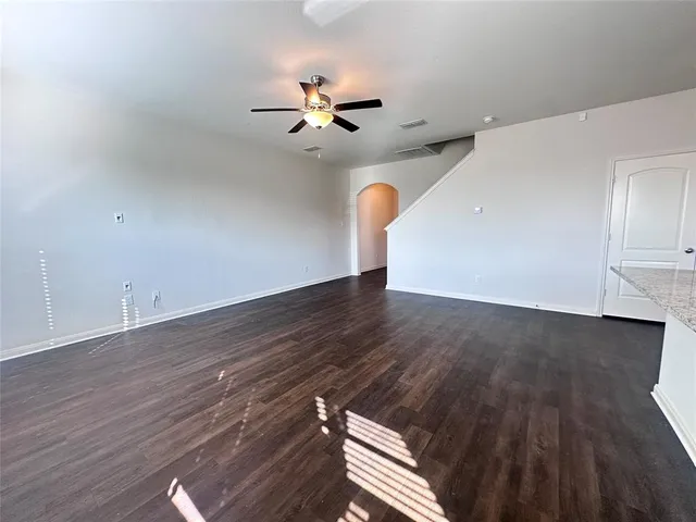 a view of a livingroom with wooden floor