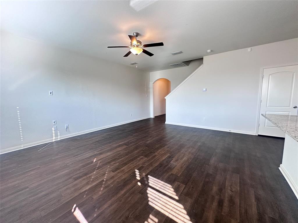 14310 Wrangler Way Dallas, TX 75253 - Photo 7 of 29 a view of a livingroom with wooden floor