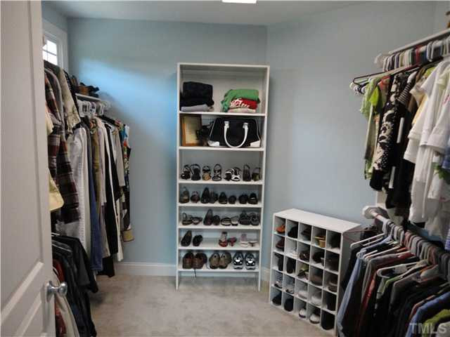 2 Rosemeade Place Durham, NC 27712 - Photo 15 of 20 a view of walk in closet with clothes and shoes