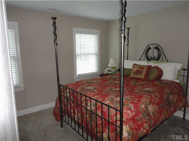 2 Rosemeade Place Durham, NC 27712 - Photo 16 of 20 a bedroom with a bed and a window