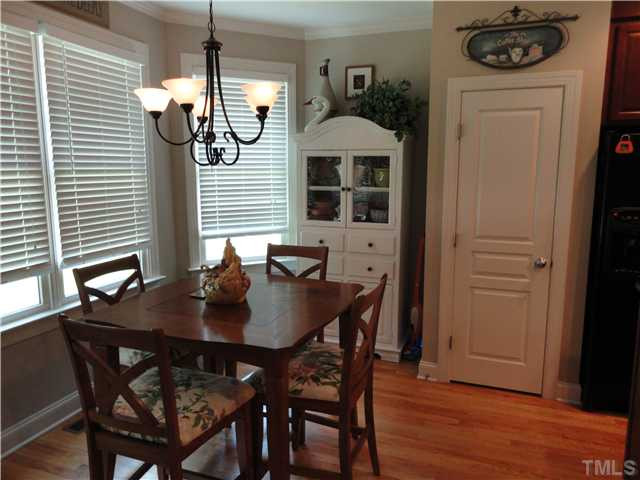 2 Rosemeade Place Durham, NC 27712 - Photo 10 of 20 a view of a dining room with furniture and wooden floor