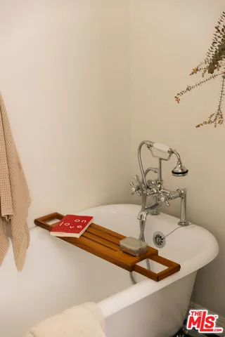 a kitchen with a sink stove and refrigerator