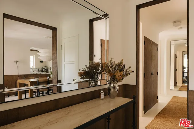 a bathroom with a sink and mirror